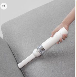 White handheld vacuum